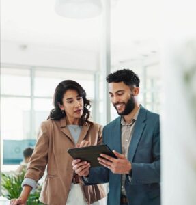 two people looking at iPad