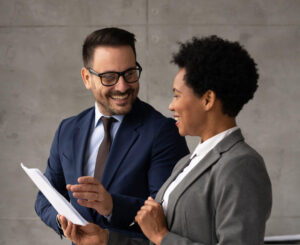 Professionals talking looking at documents