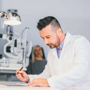 optometrist doing paperwork