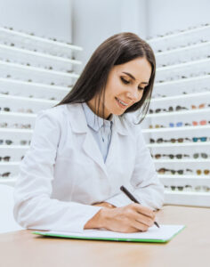 optometrist doing paperwork