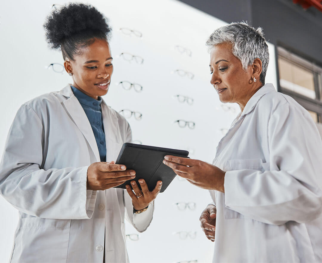 Optometrists looking at an iPad