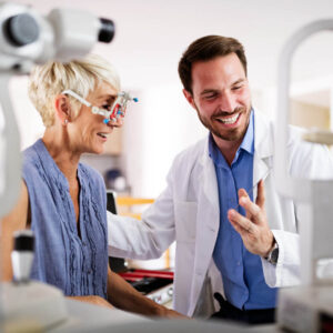 Optometrist and client performing eye exam