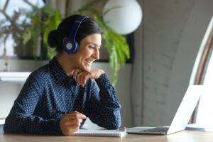 Woman watching a webinar