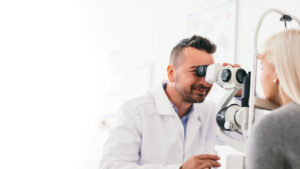 optometrist with patient