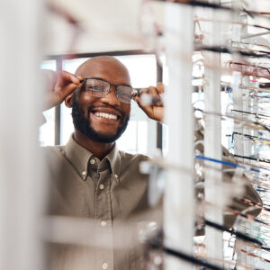 Man trying on glasses