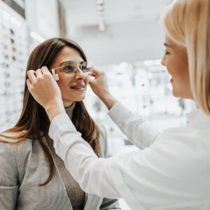 Woman trying on new frames