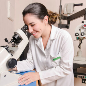 Optometrist looking through a machine