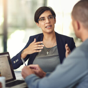 Practice owner being consulted in a meeting