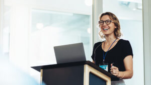 Woman giving a keynote presentation