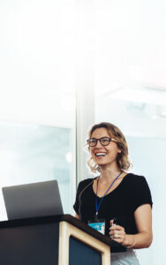 Woman giving a keynote presentation